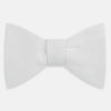 View 1 of product The Turnbull & Asser White Marcella Bow Tie features a classic shape and textured finish, ideal for formal occasions and elegantly presented against a plain white background.