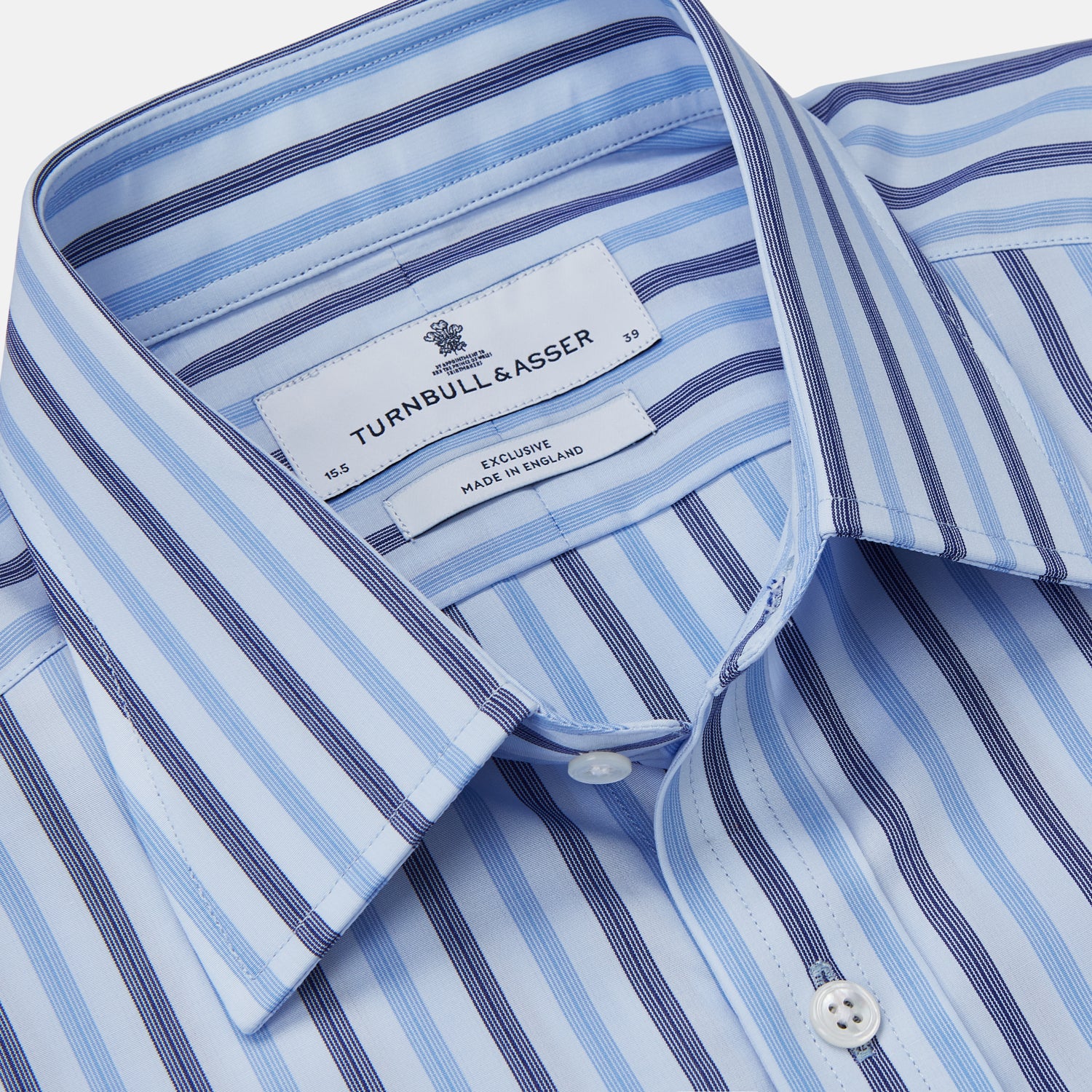 View 2 of product The Turnbull & Asser Pale Blue Multi Stripe Cotton Regular Fit Whitby Shirt, with collar and cuffs, is shown laid flat on a white background.