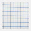 View 2 of product The Turnbull & Asser Colony Blue Grid Check Hand-Rolled Handkerchief features a white base with intersecting light and dark blue plaid lines forming squares, shown folded on a plain white background.