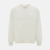 View 1 of product The Turnbull & Asser Ivory Cashmere V-neck Jumper features long sleeves with ribbed cuffs and hem, showcasing timeless knitwear style against a white background.