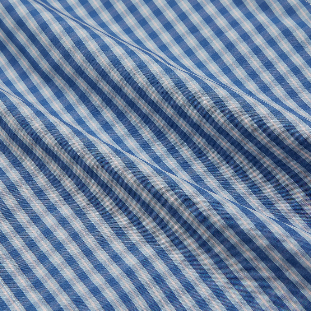 The Turnbull & Asser Navy Multi Check Cotton Regular Fit Mayfair Shirt features long sleeves, button-down front, collar, and buttoned cuffs in a navy and white check pattern, shown against a plain white background.