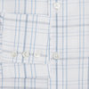 View 4 of product The Turnbull & Asser Blue and Grey Multi Check Mayfair Shirt features a T&A collar, cuffed long sleeves, and a light blue and gray plaid pattern on white.
