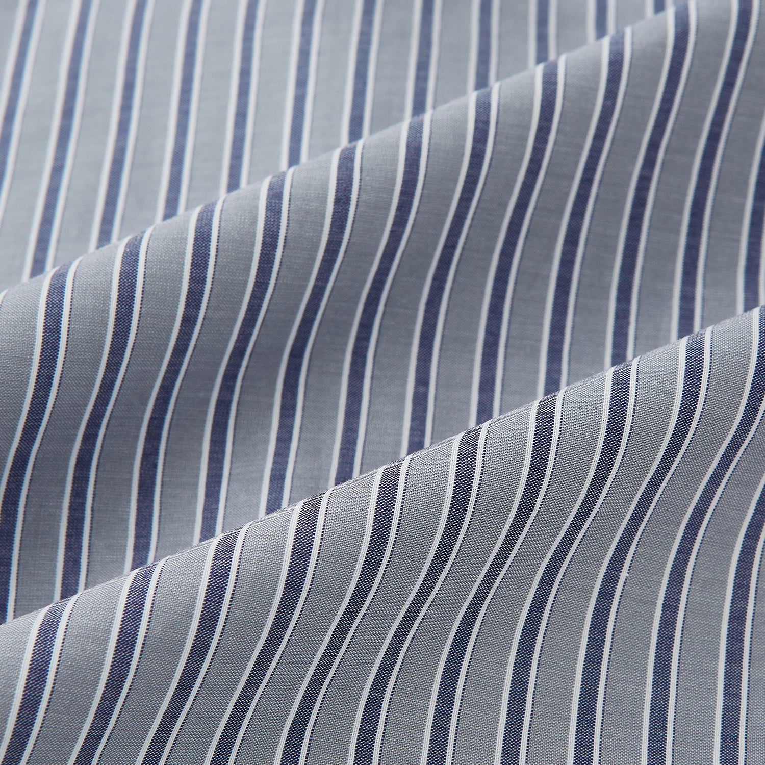 Image 8 of product The Turnbull & Asser Grey Ticking Stripe Westminster Shirt features thin vertical grey stripes and a classic collar, showcased against a plain white background.