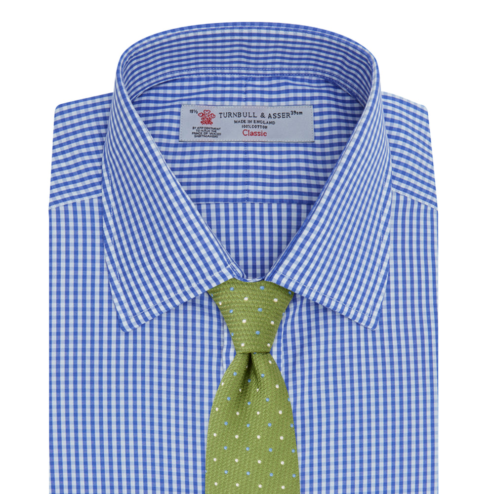 The Turnbull & Asser Mid-Blue Gingham Check Shirt features a T&A collar and 3-button cuffs, crafted from soft cotton and displayed against a plain white background.