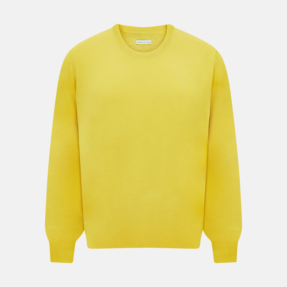 The Turnbull & Asser Canary Yellow Merino Round Neck Jumper features long sleeves and a crew neckline, shown here against a white background.