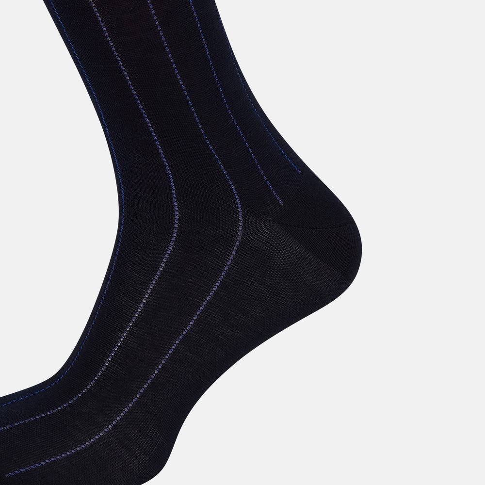 The Azzurro Dash Striped Mid-Length Sock by Turnbull & Asser features a single black sock with thin vertical light blue stripes, displayed on a plain white background. Comfortable mid-calf fit, ideal for everyday wear.