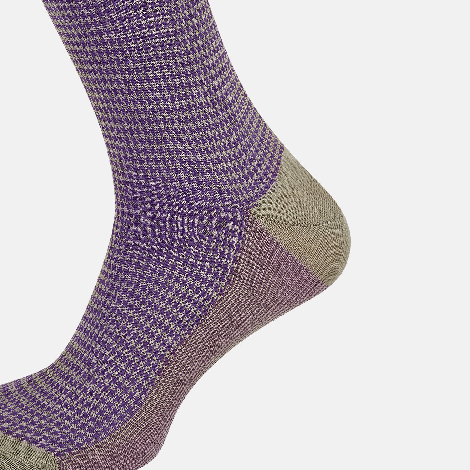 View 4 of product The Concrete Houndstooth Long Sock by Turnbull & Asser features a knee-high design with beige cuff, toe, and heel, plus a purple and black checkered pattern, shown on a plain white background.