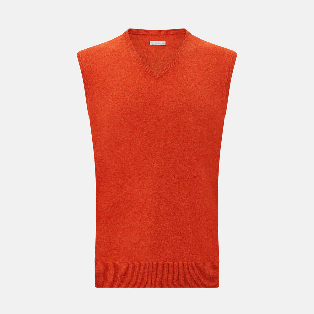 The Turnbull & Asser Red Orange Cashmere Sleeveless Vest with a V-neck, ribbed hem, and minimalist design is showcased against a white background—ideal for the refined gentleman.