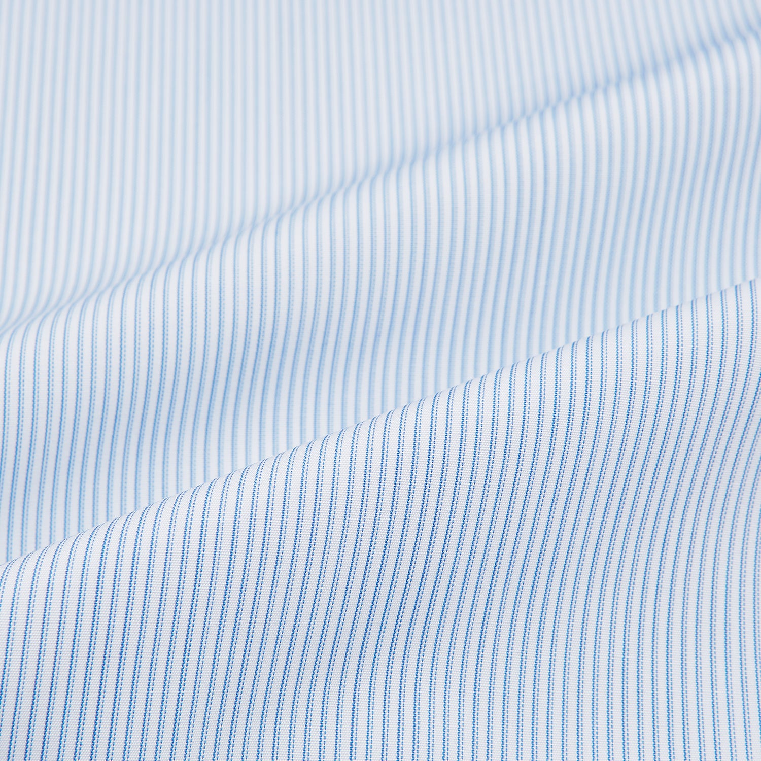 View 6 of product The Turnbull & Asser Sky Blue Hairline Multi Stripe Shirt features a contrast T&A collar and cuffs in white, Mayfair fit, and front buttons, displayed on a plain white background.
