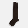 View 2 of product The Coffee Micro Knit Long Sock by Turnbull & Asser is shown in black, displayed over the calf on a white background at a slight angle as if worn on a foot.