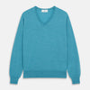 View 1 of product The Turquoise Kennedy Merino V-Neck Jumper by Turnbull & Asser features ribbed cuffs and hem, crafted from premium merino knitwear, and is shown flat on a white background.
