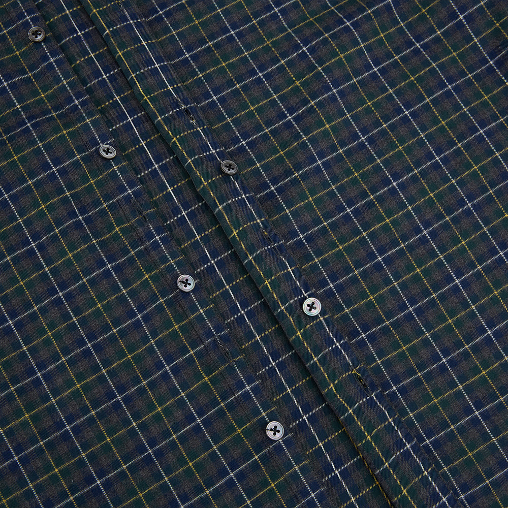 The Turnbull & Asser Navy and Khaki Tartan Windsor Shirt features a long-sleeve button-up design with a Windsor collar and buttoned cuffs, showcasing British craftsmanship in a classic tartan pattern.