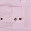 View 4 of product The Pink Rugby Polo Shirt by Turnbull & Asser features long sleeves, a collar, and V-neck opening in luxury cotton, shown flat on a white background.