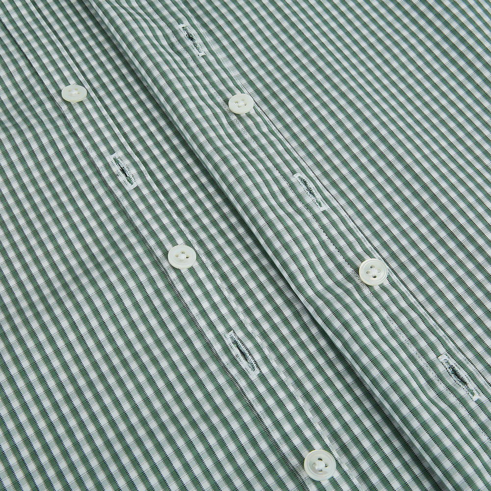 The MELON GREEN MICRO SHADOW CHECK WESTMINSTER SHIRT by Turnbull & Asser is a long-sleeved, button-up shirt with a green and white checkered pattern, pointed collar, and buttoned cuffs, shown on a white background.