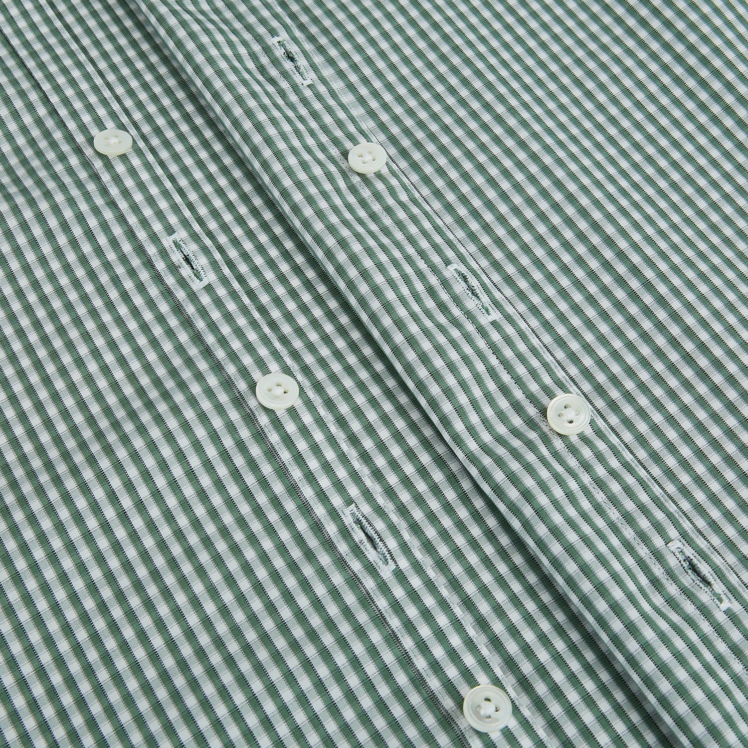 View 7 of product The MELON GREEN MICRO SHADOW CHECK WESTMINSTER SHIRT by Turnbull & Asser is a long-sleeved, button-up shirt with a green and white checkered pattern, pointed collar, and buttoned cuffs, shown on a white background.