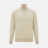 View 1 of product The Turnbull & Asser Cream Half-Zip Cashmere Jumper is a beige, long-sleeve pullover with a high collar, showcasing timeless knitwear style against a plain white background.