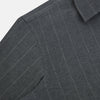 View 6 of product The Charcoal Melange Wide Stripe Westminster Shirt from Turnbull & Asser features long sleeves, a tailored fit, pointed collar, buttoned cuffs, and subtle wide stripes, shown laid flat on a white background.