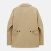 View 3 of product The Camel Wellington Double-Breasted Caban Coat by Turnbull & Asser features wide lapels, dark buttons, front flap and chest pockets, plus buttoned cuffs—perfect for elevating your formal wear collection.