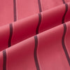 View 6 of product The Coral Red Track Stripe Mayfair Shirt by Turnbull & Asser features long sleeves, button-up front, a classic T&A collar, and buttoned cuffs in vibrant Italian cotton with vertical black pinstripes, shown on a plain white background.