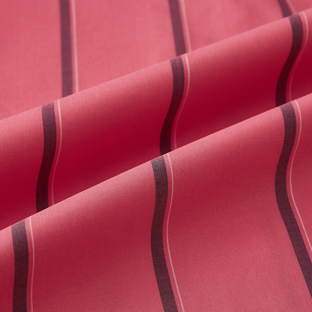 The Coral Red Track Stripe Mayfair Shirt by Turnbull & Asser features long sleeves, button-up front, a classic T&A collar, and buttoned cuffs in vibrant Italian cotton with vertical black pinstripes, shown on a plain white background.