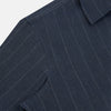 View 6 of product The Turnbull & Asser Navy Melange Wide Stripe Westminster Shirt features a classic collar, buttoned cuffs, and a tailored fit, showcasing British craftsmanship. Laid flat on a white background.