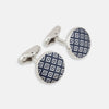 View 1 of product Turnbull & Asser Blue Lattice Circle Cufflinks: sterling silver round cufflinks with a navy blue and white square pattern, shown on a plain white background.