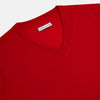 View 2 of product The Turnbull & Asser Red Fine Merino V-Neck Jumper, a classic long-sleeve knitwear piece, is shown on a white background.