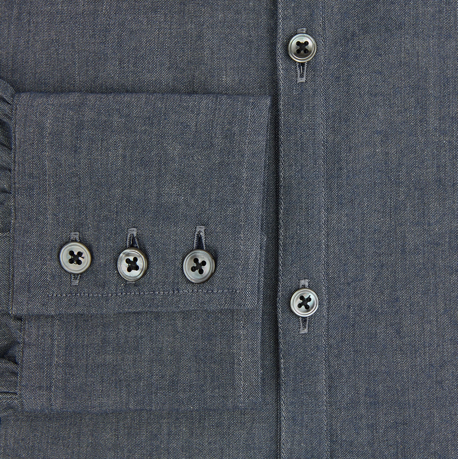 View 4 of product The Turnbull & Asser Azzurro Westminster Shirt in dark grey features long sleeves, a classic collar, buttoned cuffs, and a straight hem, showcased against a white background, highlighting refined British craftsmanship.