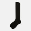 View 2 of product A single Dark Chocolate Long Sock by Turnbull & Asser is displayed against a plain white background, showcasing its knee-high length and foot shape.