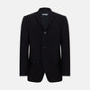 View 1 of product The Navy Apsley Single-Breasted Caban Coat by Turnbull & Asser features three buttons, notch lapels, a chest pocket, and two front flap pockets, shown against a plain light gray background.
