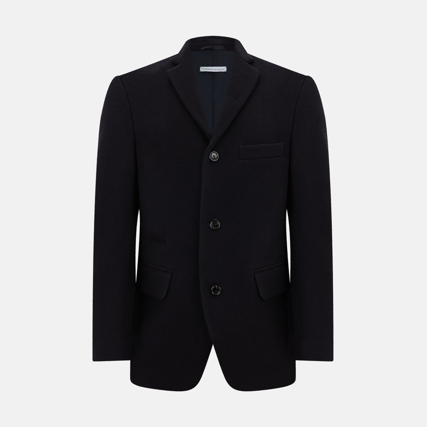 View 1 of product The Navy Apsley Single-Breasted Caban Coat by Turnbull & Asser features three buttons, notch lapels, a chest pocket, and two front flap pockets, shown against a plain light gray background.