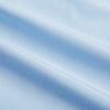View 6 of product The Turnbull & Asser Light Blue End-on-End Shirt features a crisp white T&A contrast collar and double cuffs, shown flat on a white background.