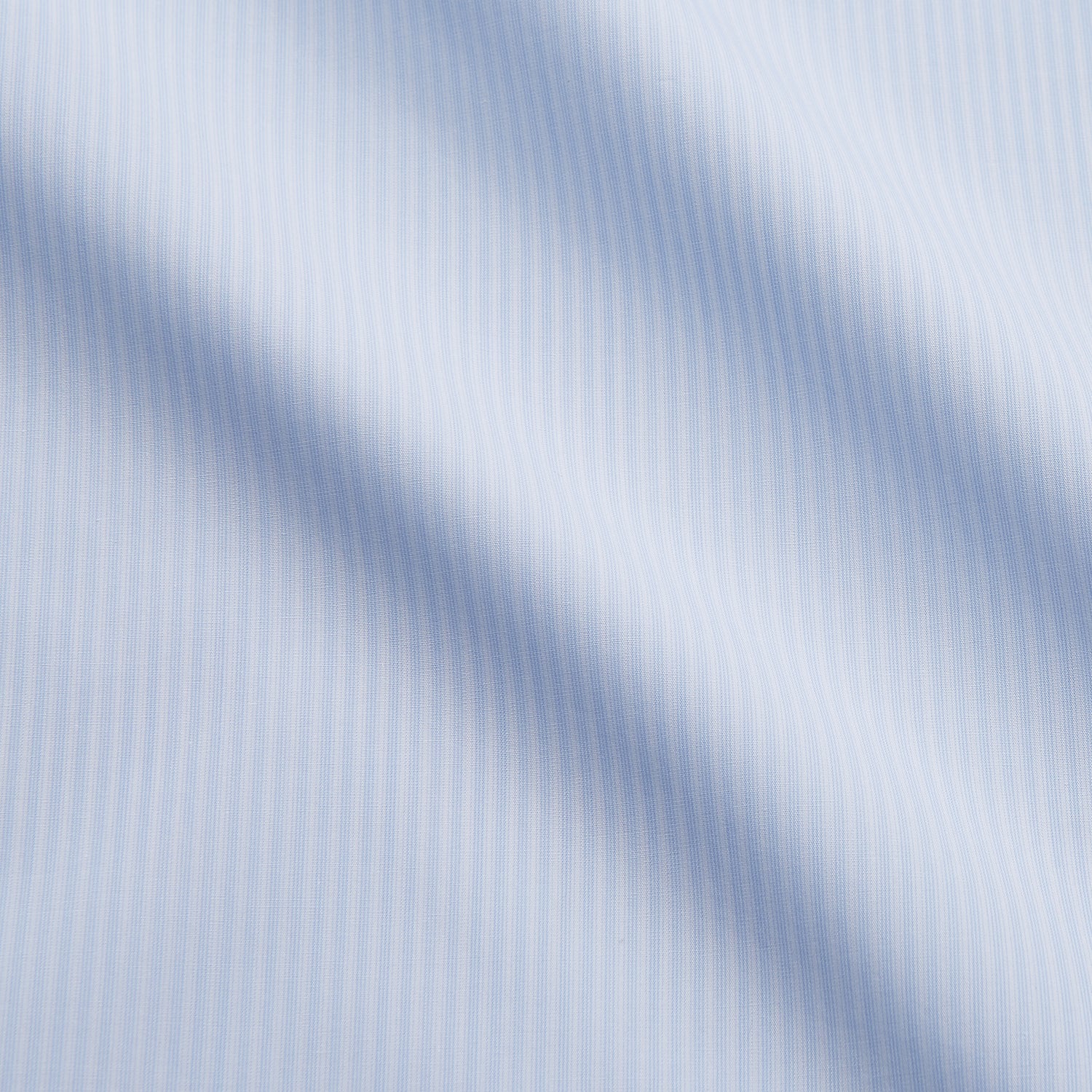 View 3 of product The Turnbull & Asser Pale Blue Stripe Cotton Weekend Fit Williams Shirt features short sleeves, a collar, a single chest pocket, and Italian cotton material, displayed on a plain white background.