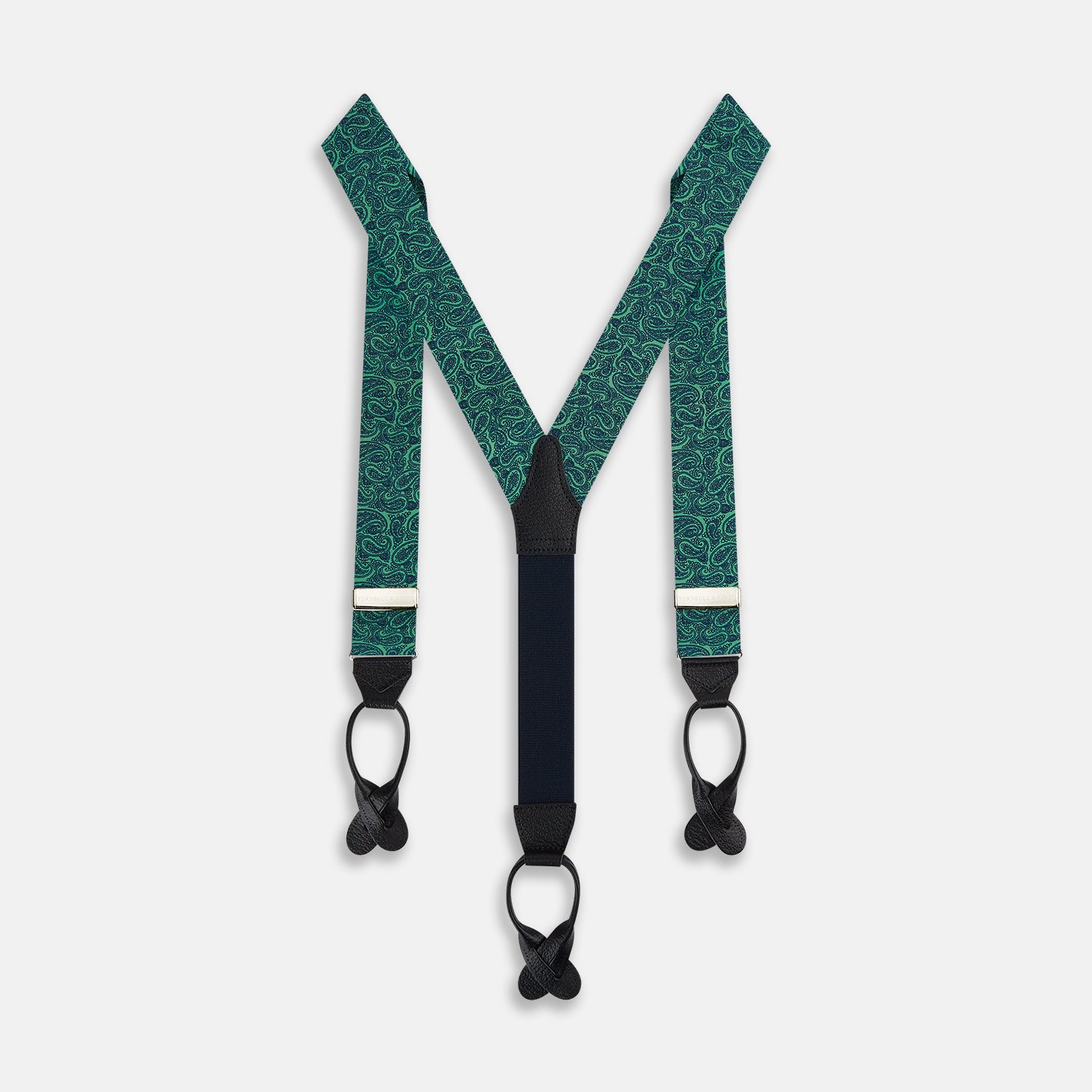 Image 1 of product Turnbull & Asser's Kelly Green Paisley Adjustable Silk and Navy Leather Braces feature a bold paisley pattern, adjustable fit, and navy leather detailing. Shown flat on a white background—ideal for refined, elegant styling.