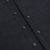 View 7 of product The Turnbull & Asser Midnight Blue Westminster Shirt features long sleeves, a button-up front, classic collar, and buttoned cuffs in a plain design—showcasing British craftsmanship—laid flat on a white background.