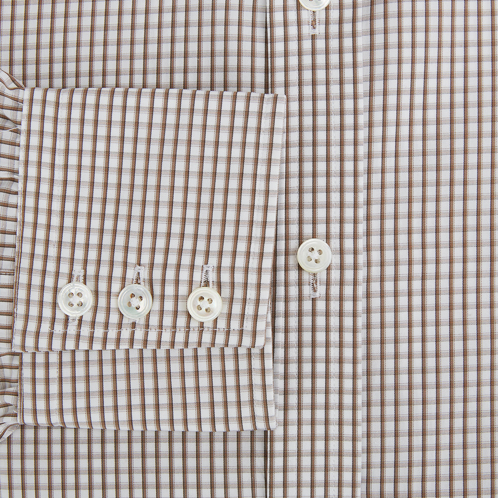 The Coffee Micro Shadow Check Mayfair Shirt by Turnbull & Asser is a long-sleeved, button-up shirt made from fine Italian cotton with a small brown and white check pattern, classic collar, and buttoned cuffs—an essential for any man’s wardrobe.
