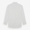View 3 of product The Turnbull & Asser White Poplin Shirt With Regent Collar and 2-Button Cocktail Cuffs, featuring long sleeves, is buttoned up and laid flat on a white background.