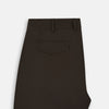 View 5 of product A pair of straight-leg Moss Green Winston Trousers by Turnbull & Asser in high-twist cotton with belt loops, button closure, and side pockets, displayed on a plain white background.