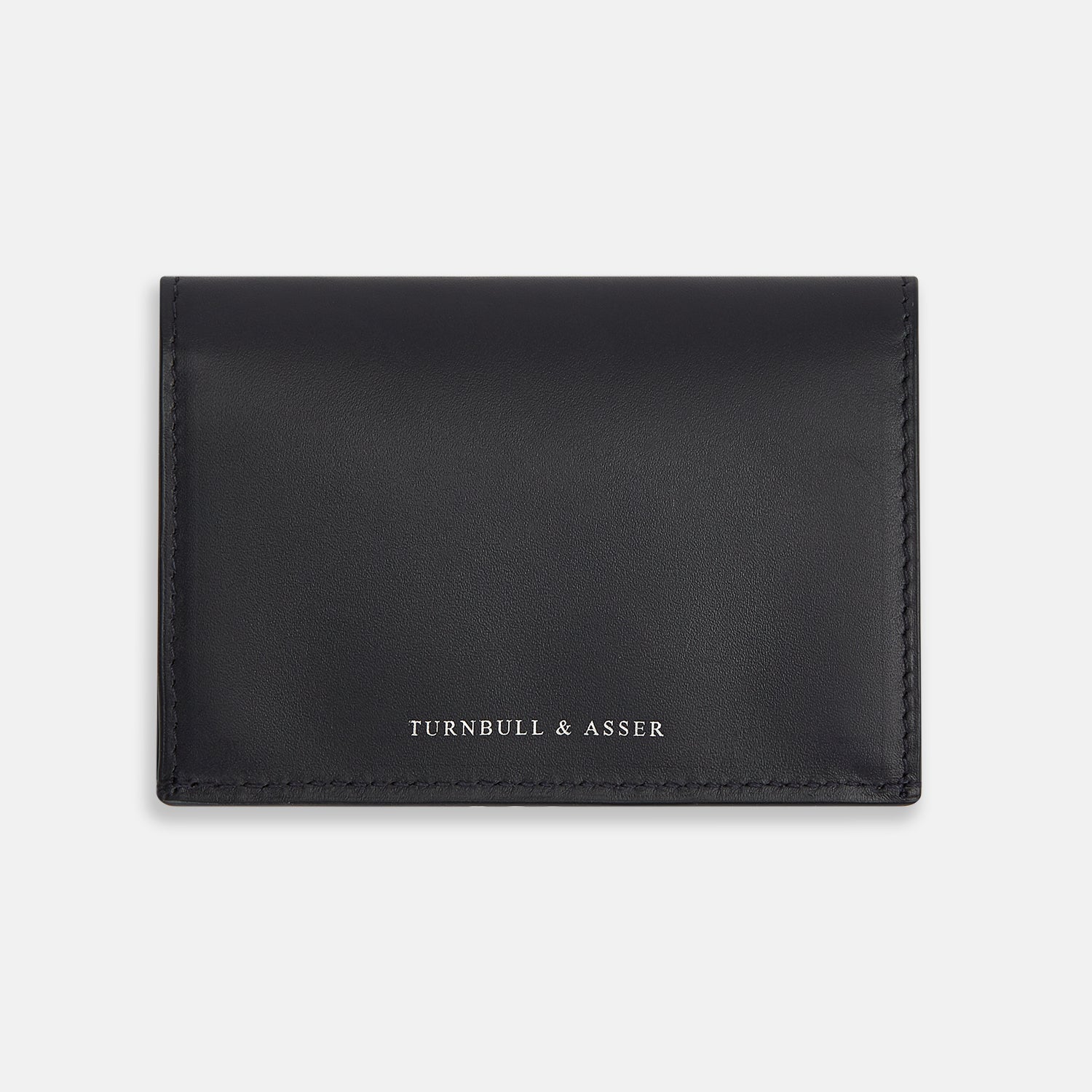 Image 1 of product A navy full-grain leather bi-fold card holder with neat stitching and "Turnbull & Asser" embossed in white near the bottom center.