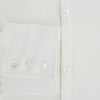 View 4 of product The Vanilla Linen Westminster Shirt by Turnbull & Asser is a long-sleeve, white button-up with a Turnbull collar, buttoned cuffs, and straight hem, highlighting British craftsmanship against a plain white background.