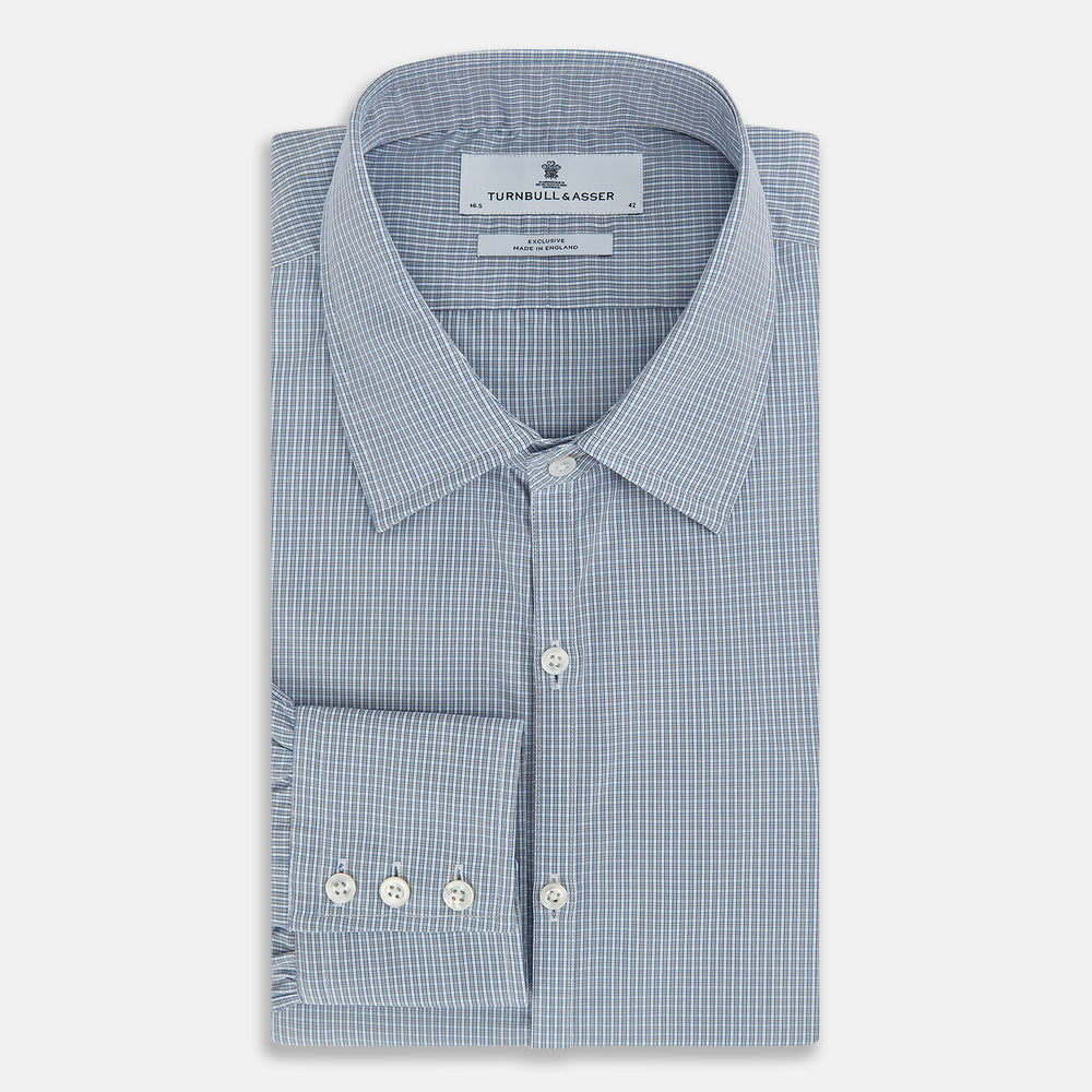 The Turnbull & Asser Blue and Brown Micro Shadow Check Westminster Shirt features a refined collar and white buttons, showcasing timeless British craftsmanship.