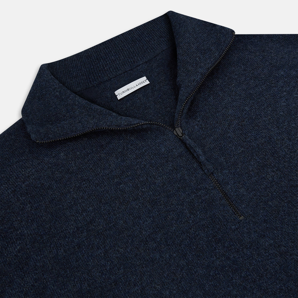 The Turnbull & Asser Navy Melange Half-Zip Cashmere Jumper features long sleeves, a high collar, and a half-zip front, showcased on a plain white background.