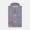 View 2 of product A circular swatch of Turnbull & Asser’s Navy and Red Prince of Wales Wide Check Cotton Fabric displays navy, white, and red intersecting stripes in a traditional check pattern, outlined by a gray border.