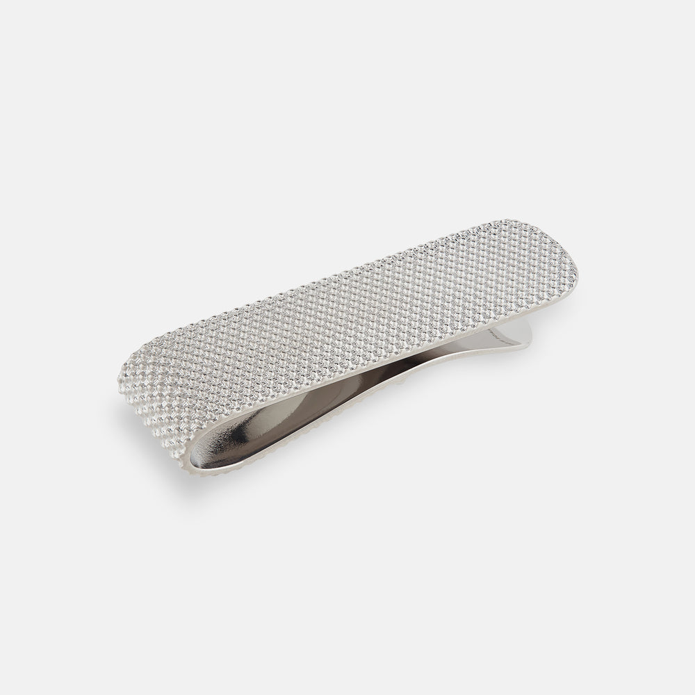 The Turnbull & Asser Silver Textured Money Clip features a diamond-patterned sterling silver surface, shown on a plain white background—a sophisticated accessory for keeping bills organized in style.