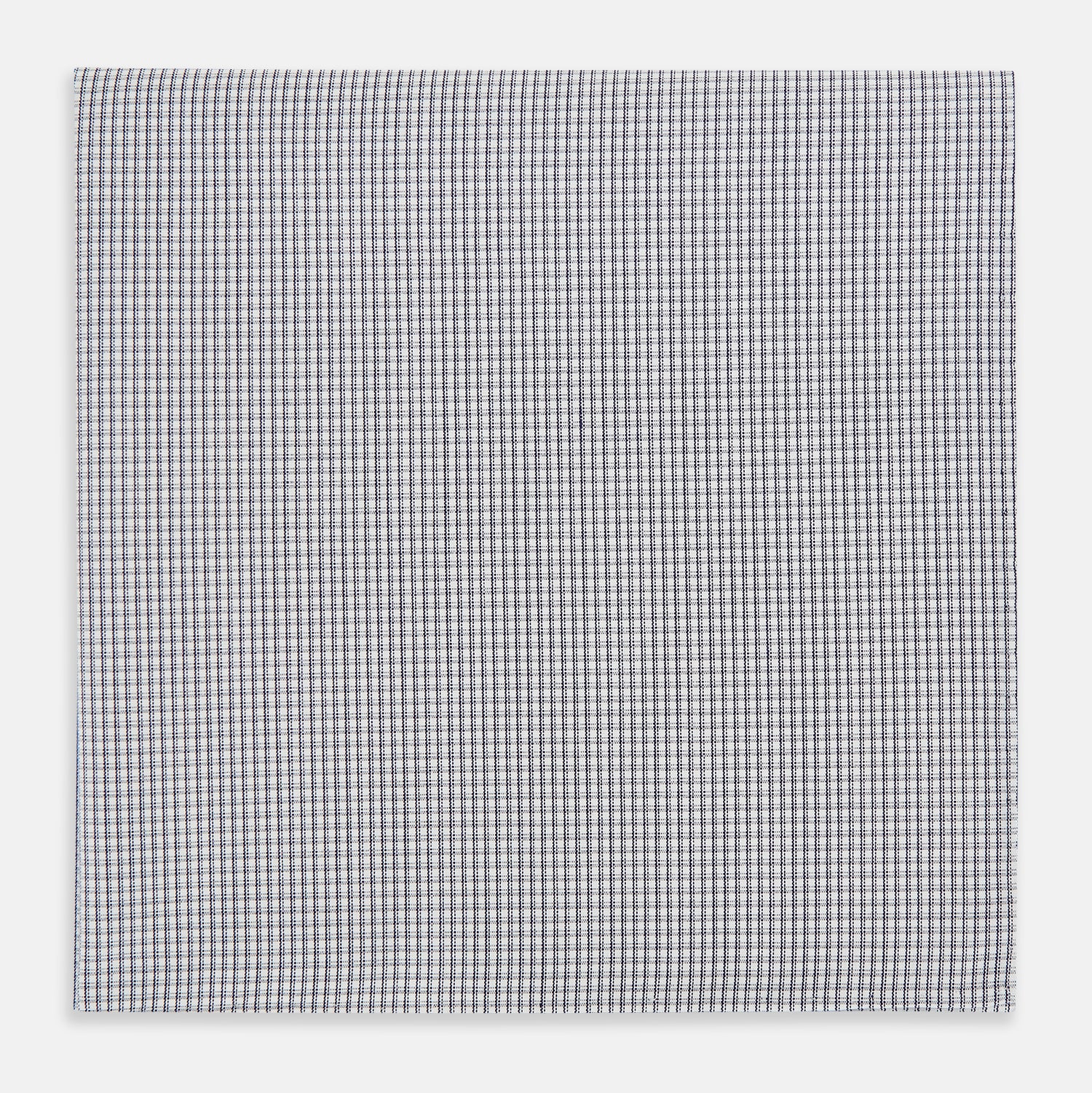 Image 1 of product The Turnbull & Asser Navy Blue Shadow Grid Check Hand-Rolled Handkerchief showcases a small, evenly spaced blue and white check pattern and hand-rolled edges, neatly displayed against a white background.