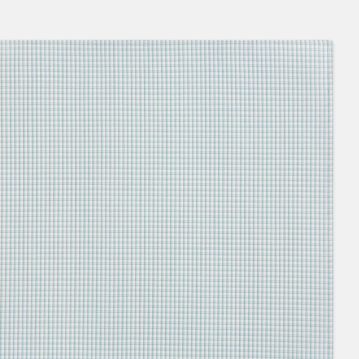 Image 2 of product The Turnbull & Asser Sage Green Shadow Grid Check Hand-Rolled Handkerchief features a grid of small squares and hand-rolled edges, shown neatly folded on a white background.