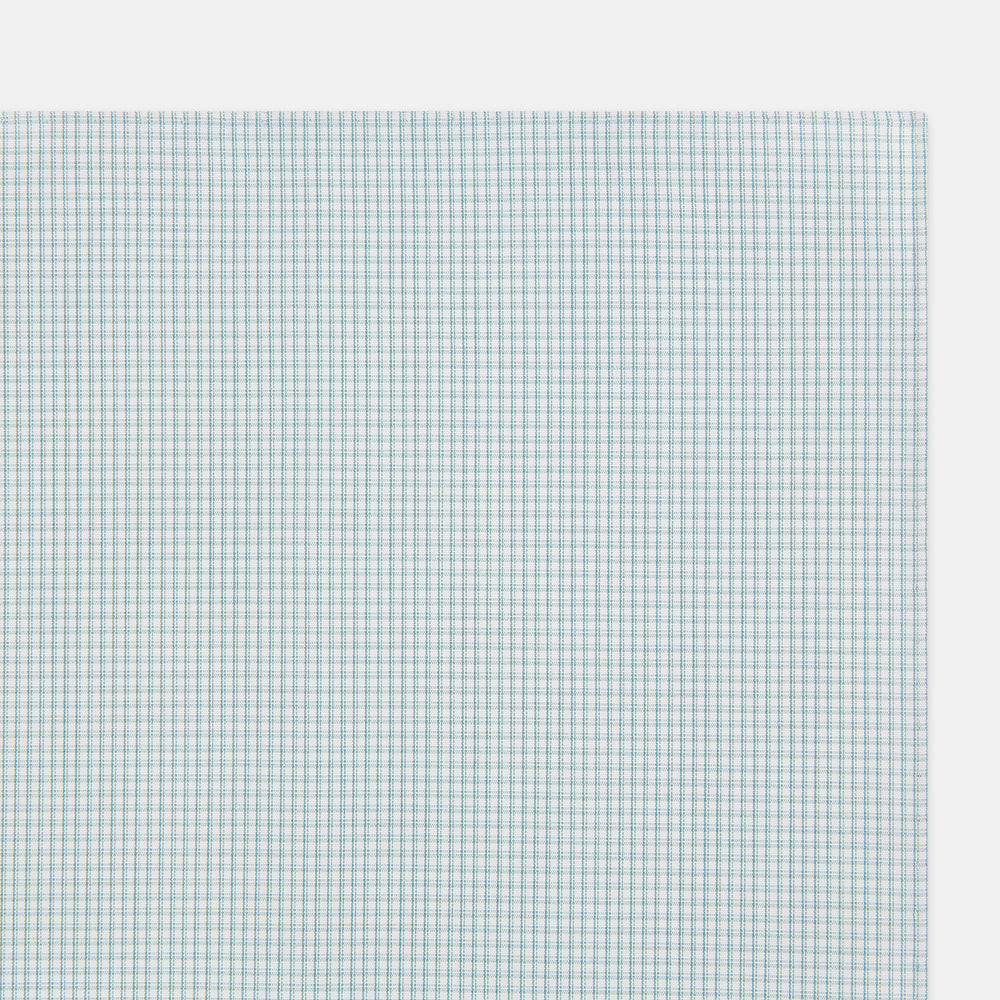 The Turnbull & Asser Sage Green Shadow Grid Check Hand-Rolled Handkerchief features a grid of small squares and hand-rolled edges, shown neatly folded on a white background.