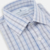 View 2 of product The Turnbull & Asser Blue and Navy Multi Check Mayfair Shirt features a classic T&A collar and long sleeves, with a blue multi-check pattern on white, neatly displayed against a plain white background.