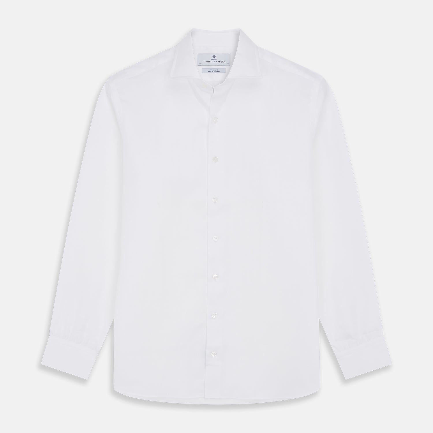 View 1 of product The Turnbull & Asser White Herringbone Tailored Fit Shirt with a Kent collar is displayed against a white background.