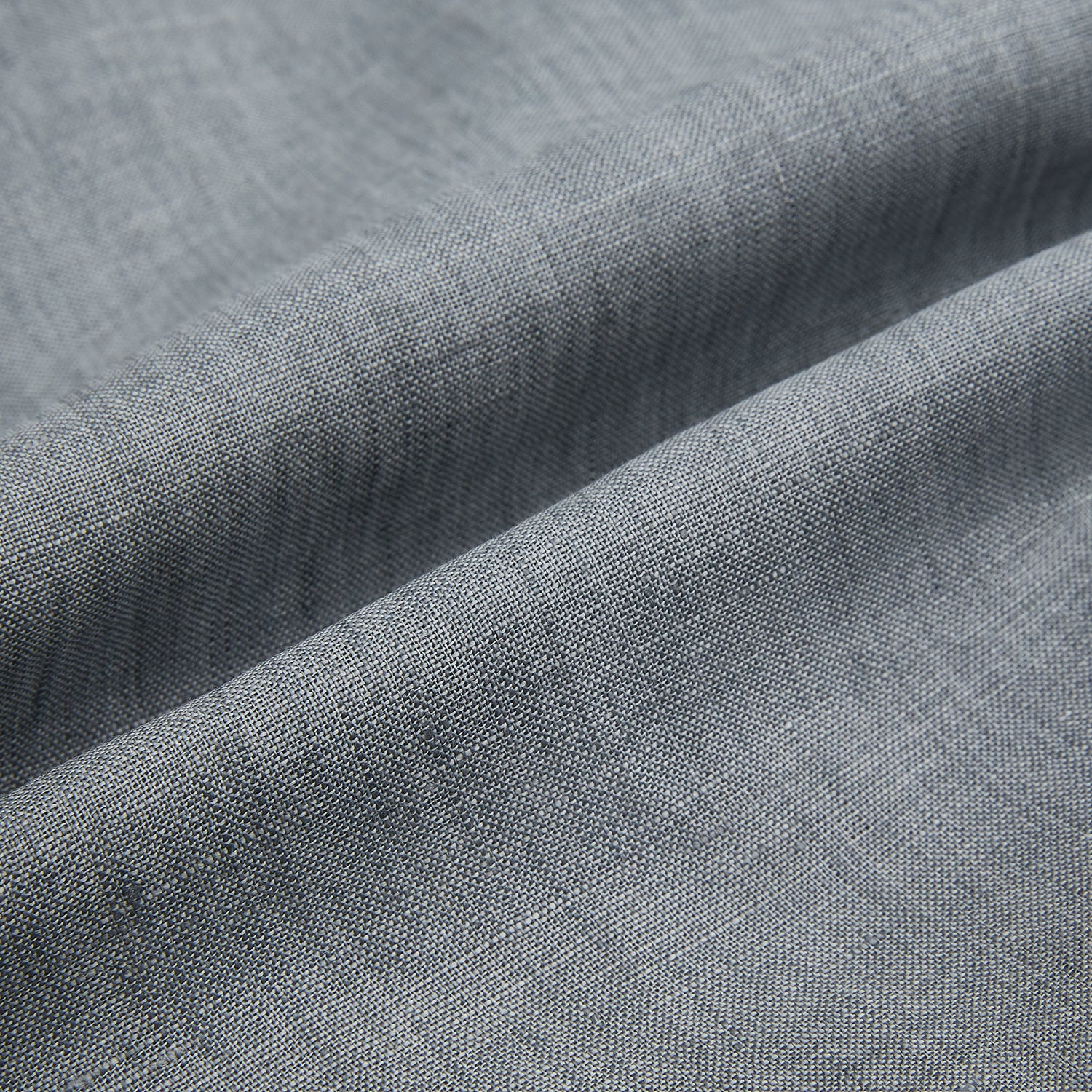 View 8 of product The Grey Linen Westminster Shirt by Turnbull & Asser is a long-sleeve, light gray button-up with a formal collar and white buttons, highlighting British craftsmanship and laid flat on a white background.